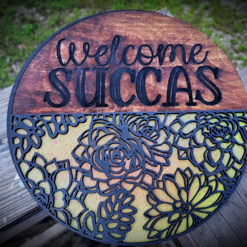 Welcome Succas Round Sign